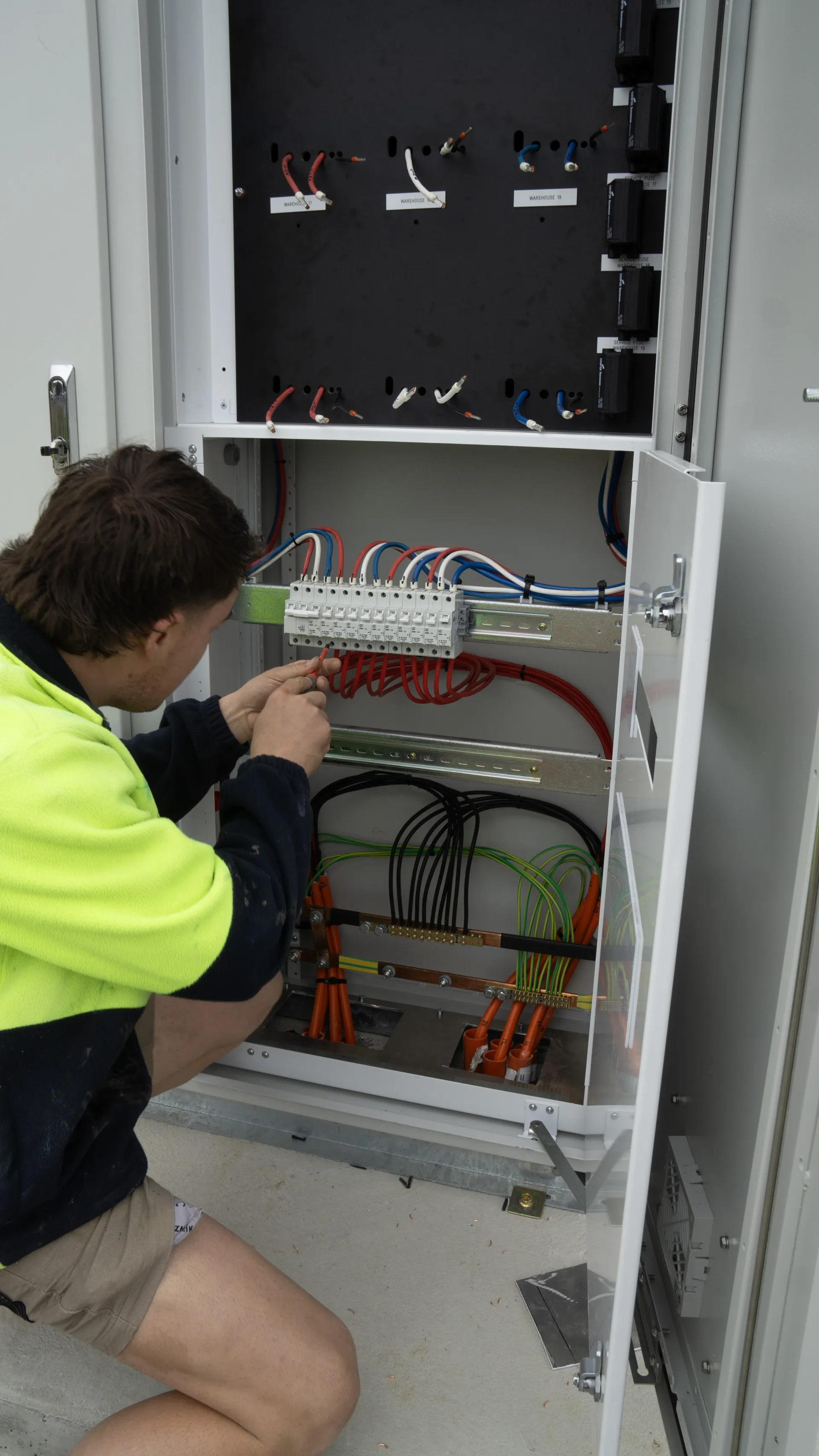 Orr Electrical electrician wiring a switchboard ahead of an air conditioning installation