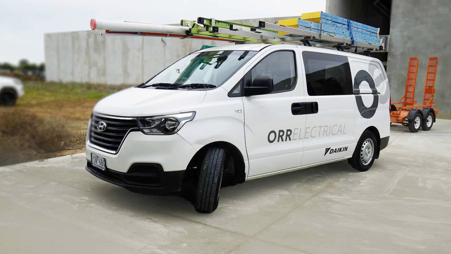Orr Electrical service van with Daikin branding outside a job